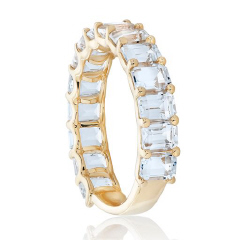 14kt yellow gold emerald cut white topaz band.