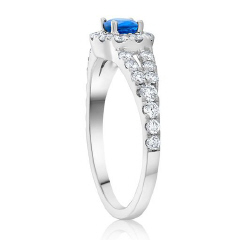 14kt white gold oval sapphire and diamond ring.