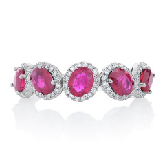 14kt white gold oval ruby and diamond halo band.