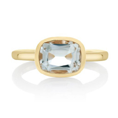 18kt yellow gold  bezel set white topaz ring