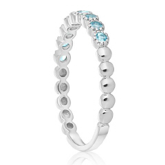 Dainty2: 14kt white gold sky blue topaz band