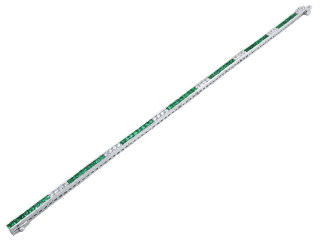 18kt white gold channel set emerald and diamond straight line bracelet.