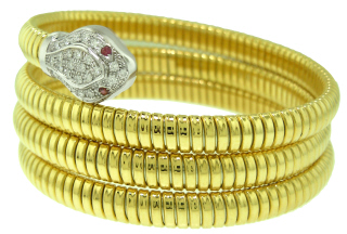 18kt two-tone 3-row serpentino diamond bangle bracelet.