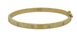 14kt yellow gold diamond bangle bracelet.