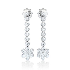 18kt white gold hanging diamond flower earrings.