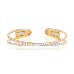 18kt yellow gold diamond criss cross bangle bracelet with clip bottom.
