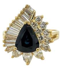 18kt yellow gold pear shape sapphire and diamond ring.