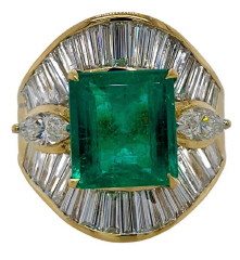 18kt yellow gold emerald and diamond ring.