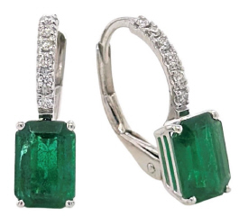 18kt white gold hanging emerald and diamond earrings.