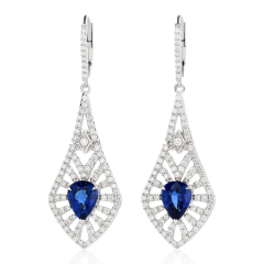 18kt white gold hanging sapphire and diamond dangle earrings.