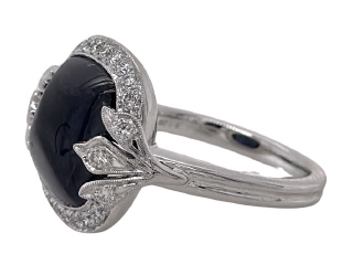 Platinum cab sapphire and diamond ring.