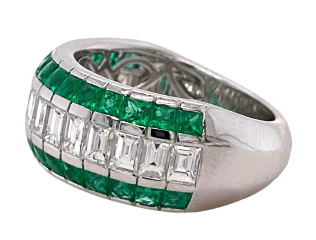 18kt white gold 3-row channel set emerald and diamond band.