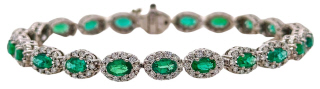 14kt white gold emerald and diamond bracelet.