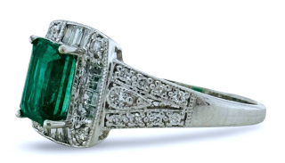 18kt white gold emerald, round and baguette diamond ring