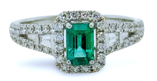 18kt white gold emerald and diamond ring.