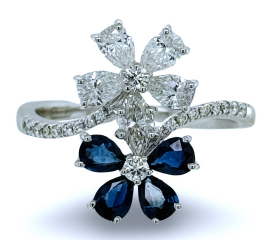 18kt white gold sapphire and diamond bypass flower ring