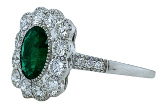 18kt white gold oval emerald and diamond halo ring