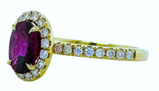 18kt yellow gold ruby and diamond halo ring