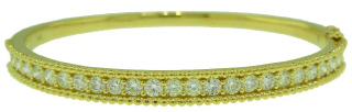 18kt yellow gold diamond bangle bracelet with beaded edge.