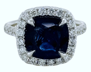 18kt white gold halo diamond and cushion sapphire ring