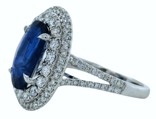 18kt white gold double halo diamond and oval sapphire ring