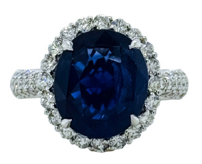 18kt white gold oval diamond halo and sapphire ring