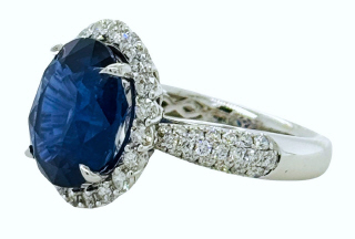 18kt white gold oval diamond halo and sapphire ring
