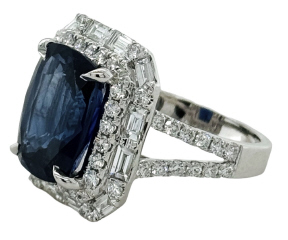 18kt white gold cushion sapphire, round and baguette diamond ring