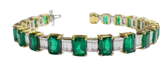 18kt two tone emerald and diamond bracelet.