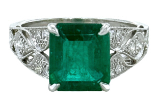 Platinum emerald and diamond ring
