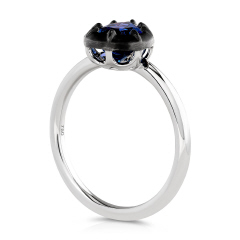 18kt white gold pear shape tanzanite ring with black rhodium.