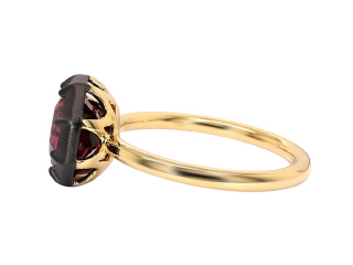 18kt yellow gold rhodolite ring with satin finish black rhodium.