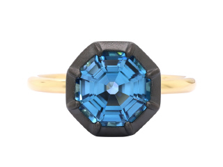18kt yellow gold swiss blue topaz ring with satin finish black rhodium.
