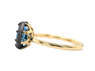 18kt yellow gold swiss blue topaz ring with satin finish black rhodium.