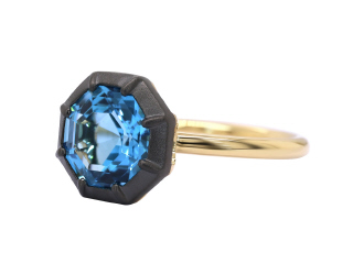 18kt yellow gold swiss blue topaz ring with satin finish black rhodium.