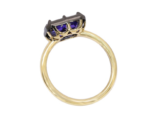 18kt yellow gold tanzanite ring with satin finish black rhodium.