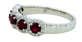 14kt white gold pink sapphire sapphire and diamond halo style band.