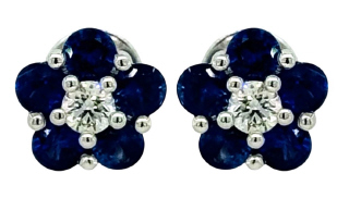 14kt white gold sapphire and diamond flower style earrings.
