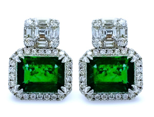 18kt white gold emerald and diamond earrings.