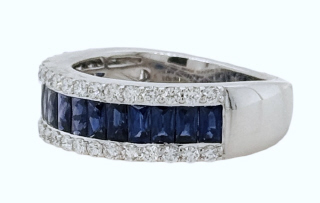 18kt white gold channel set French Cut Sapphire and diamond 1/2 way band.