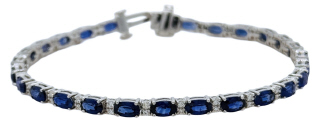 18kt white gold oval sapphire and round diamond bracelet.