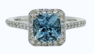 18kt white gold aqua and diamond halo ring.