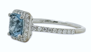 18kt white gold aqua and diamond halo ring.