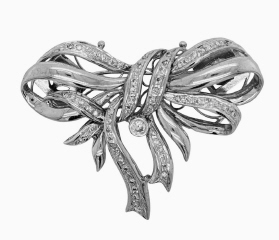 14kt white gold diamond bow pin.