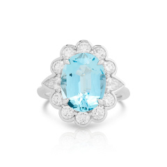 18kt white gold oval aquamarine, round and pearshape diamond halo ring