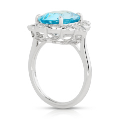 18kt white gold oval aquamarine, round and pearshape diamond halo ring