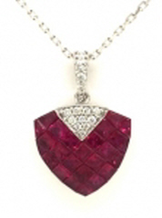 18kt white gold ruby and diamond pendant with chain.