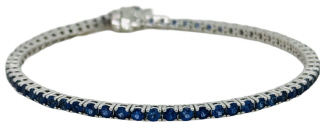 14kt white gold 4-prong stright line sapphire tennis bracelet. 8"
