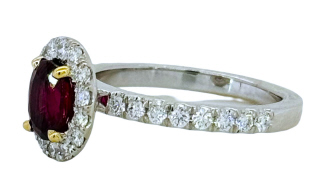 18kt white gold oval ruby and diamond halo ring