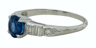 Platinum sapphire, baguette and round diamond ring